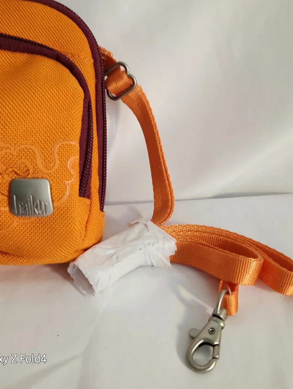 Haiku Orange Crossbody with Plum Trim and Embroidered Swirls